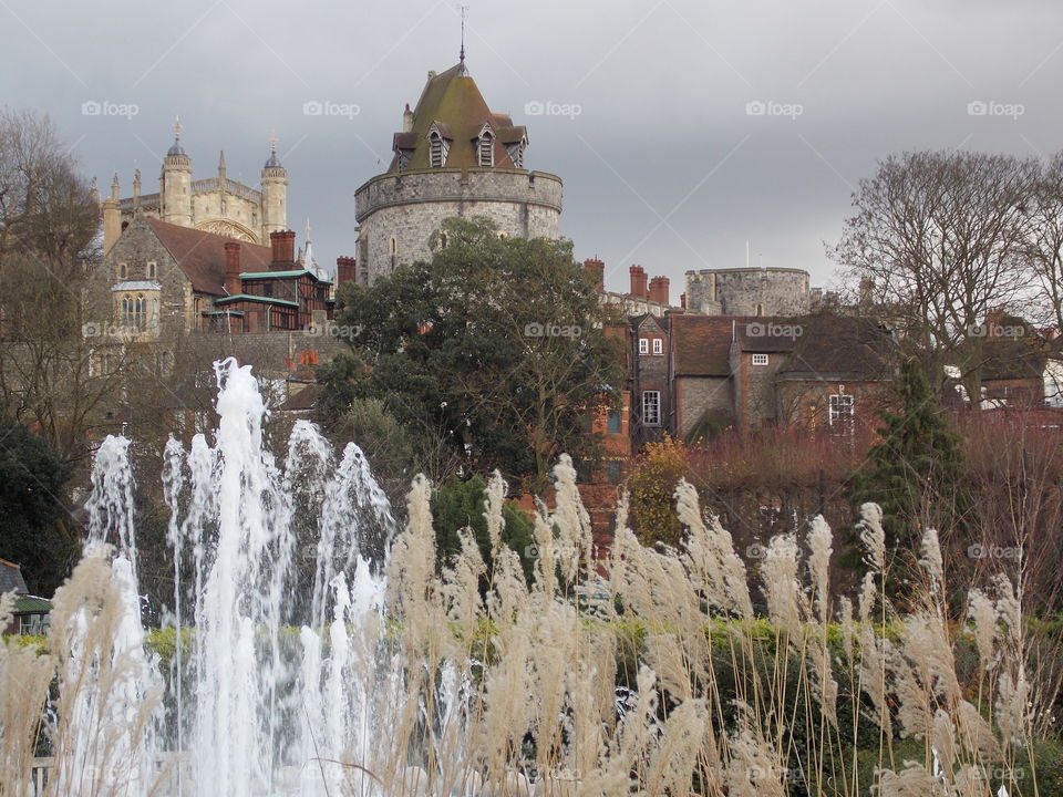 View of building and fountain near church