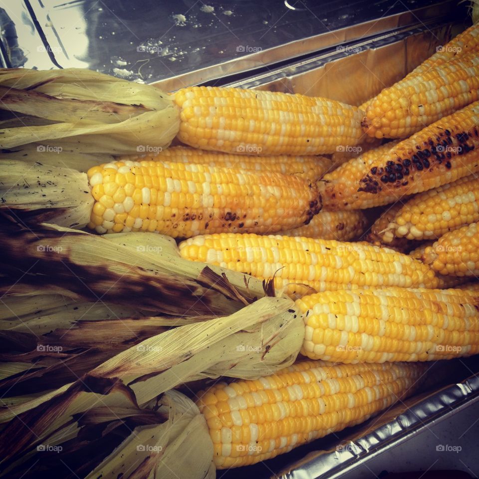 Wood grilled corn topped with butter and your choices of seasonings. A perfect finish to a summer night 