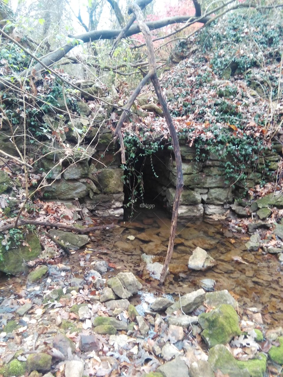 spring water come out of rock side hill