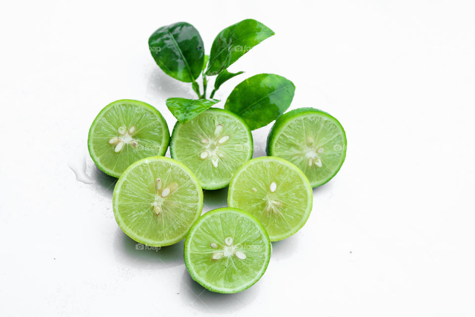 lemon with white colour background. Amazing photography of green and white colour background