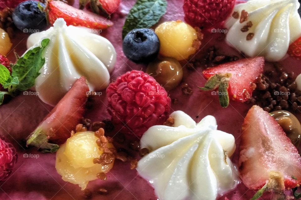 Fruits and berries on a cake