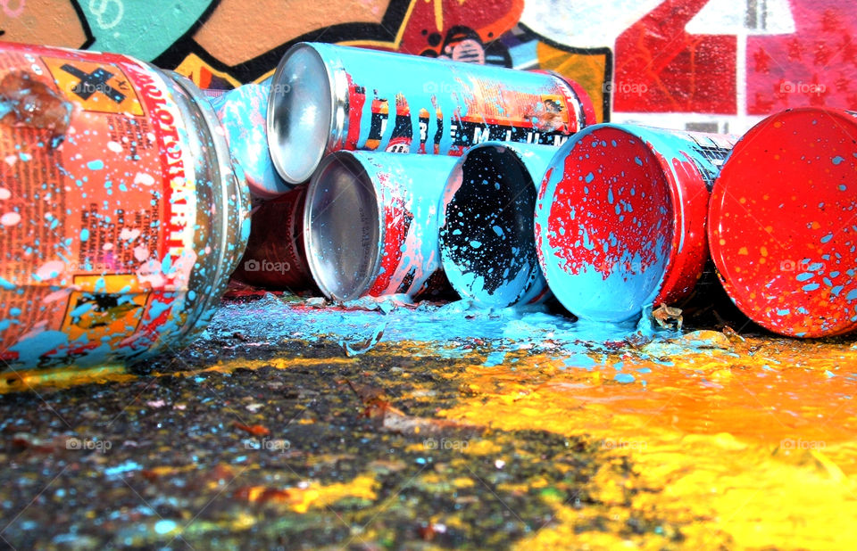 Paintsplash. Colorful paintsplash with spraycans. Graffiti all over...