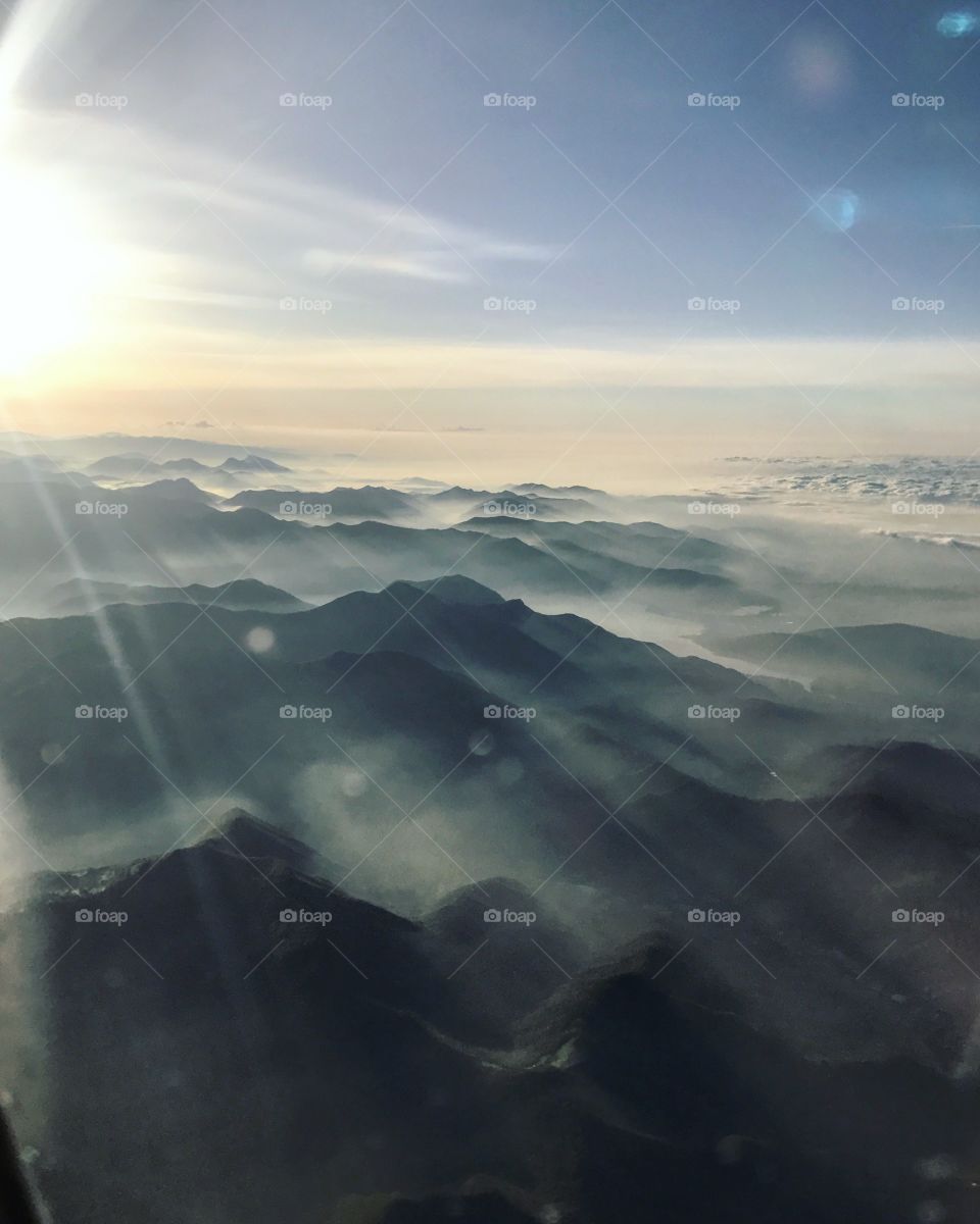 Aerial view of mountain during sunset
