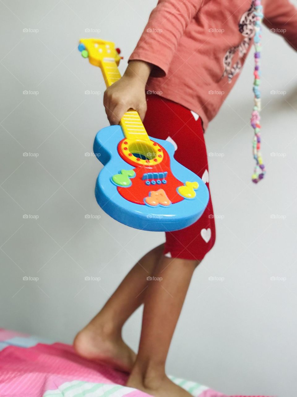 A funky girl with guitar 