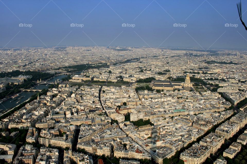 An aerial shot of Paris, from the very top of the Eiffel Tower