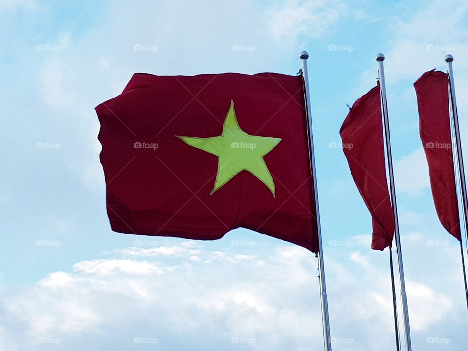 Vietnam flag and a blue sky.