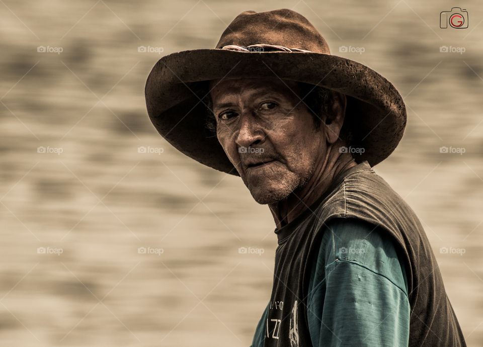 Portrait of a senior man wearing hat