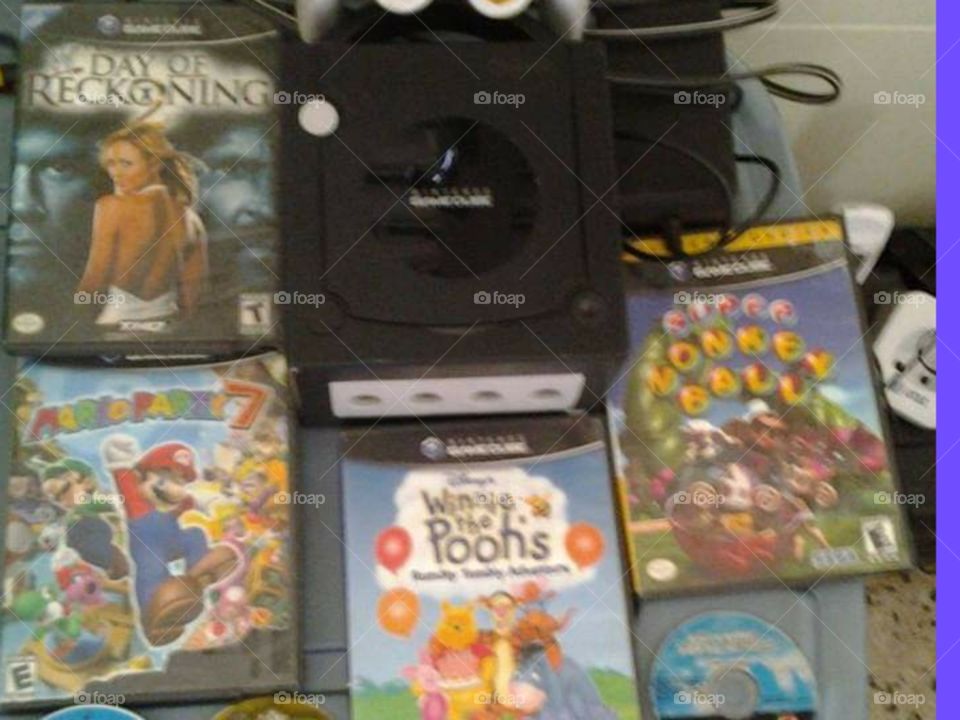 Game  Cube  and some games   by Nintendo.