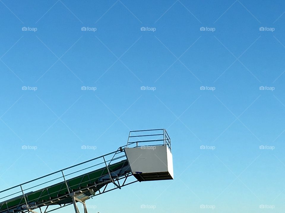 Building crane against a blue sky