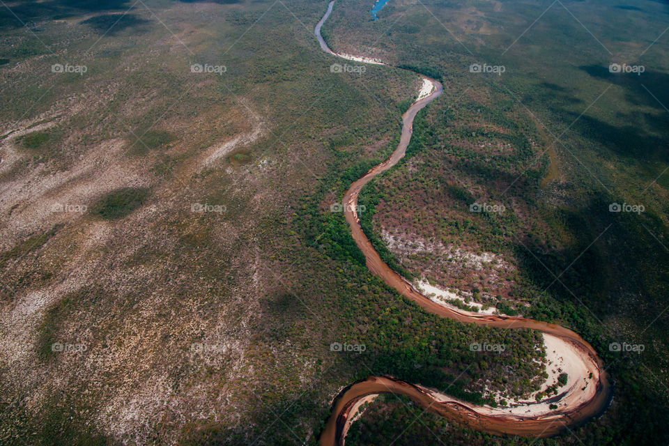 Aerial view on the river in the land