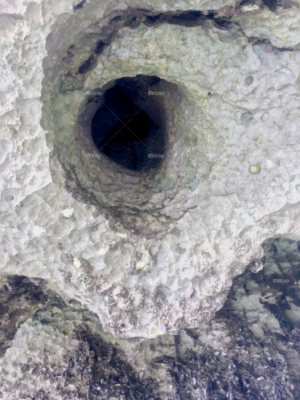 A hole in the rock formations