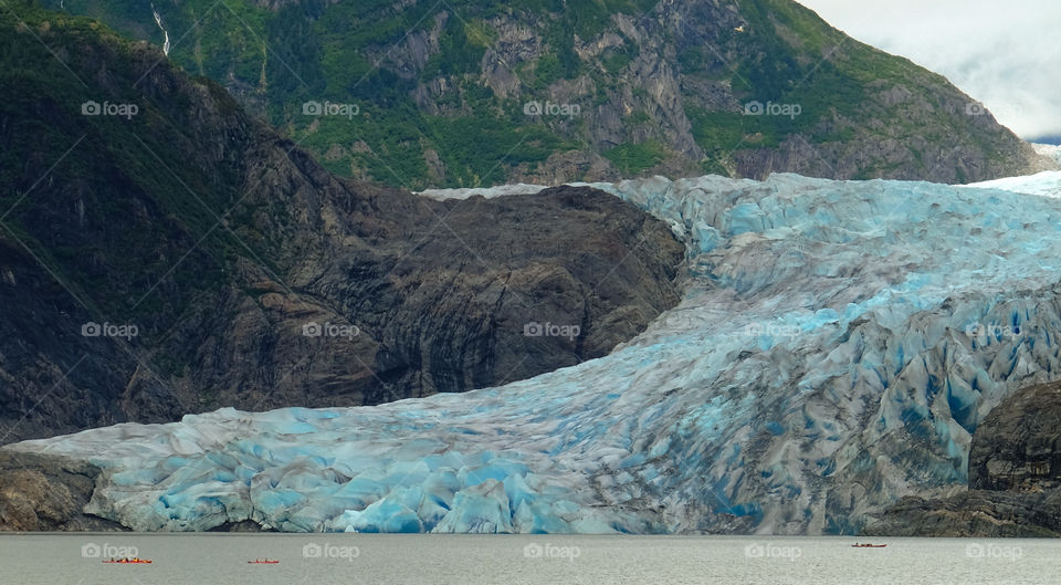 Large glacier filling out a bay