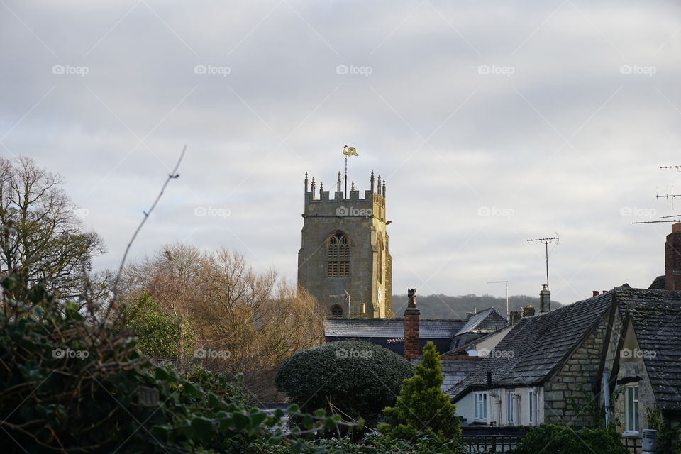 View of St Peters Church Tower From our holiday cottage garden .. delightful gold cockerill weathervane on the top ...