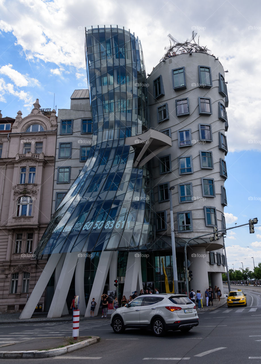 Prague, Czech Republic - 6 July 2017: Dancing House Hotel is a design luxury hotel in downtown Prague, Czech Republic on overcast summer day.