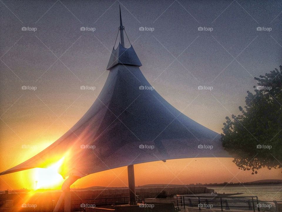 Parasol in sunset