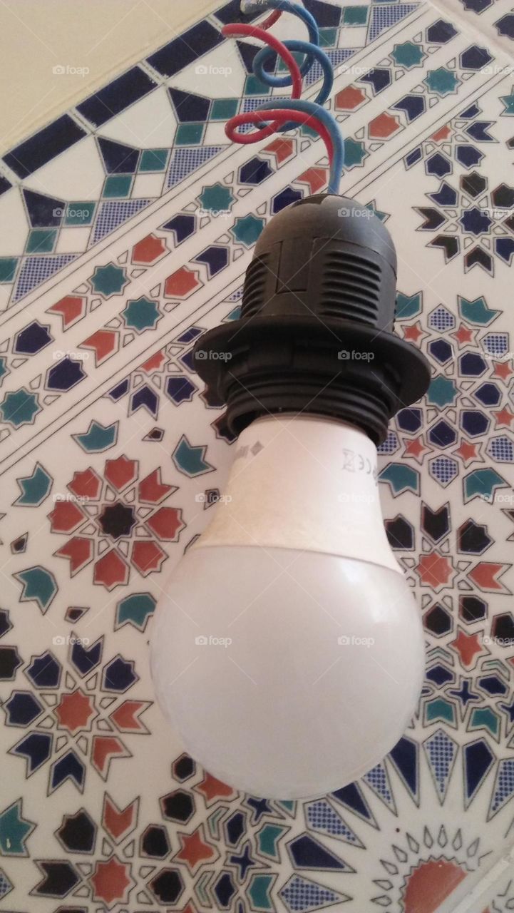 Lamp against moroccan zelige