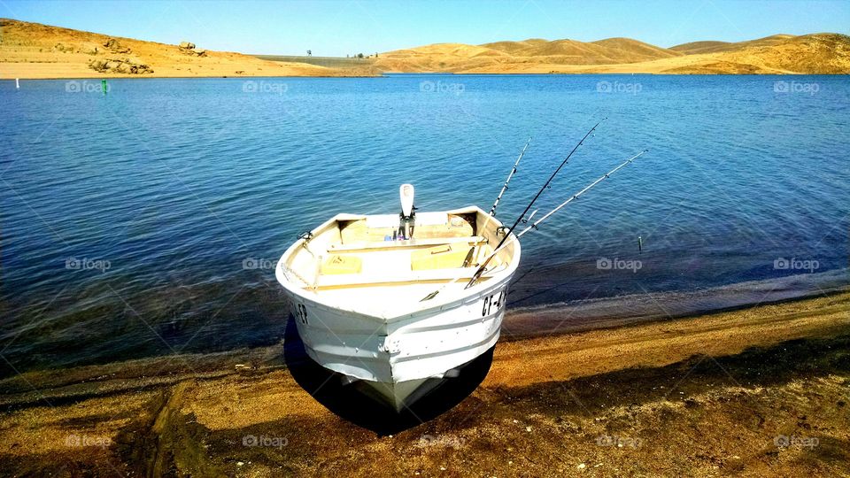 fishing boat. resting on shore