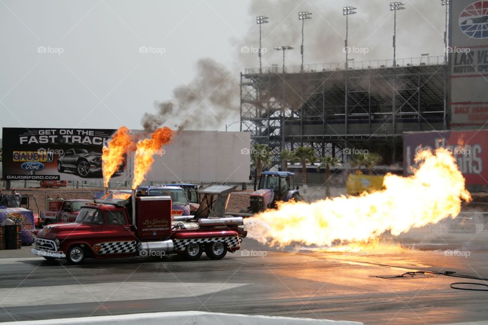 truck with flames. drag races