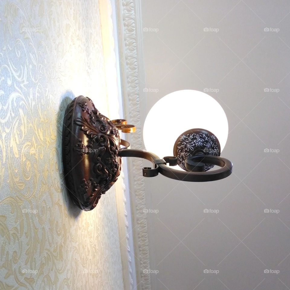 Unique lamp on the wall