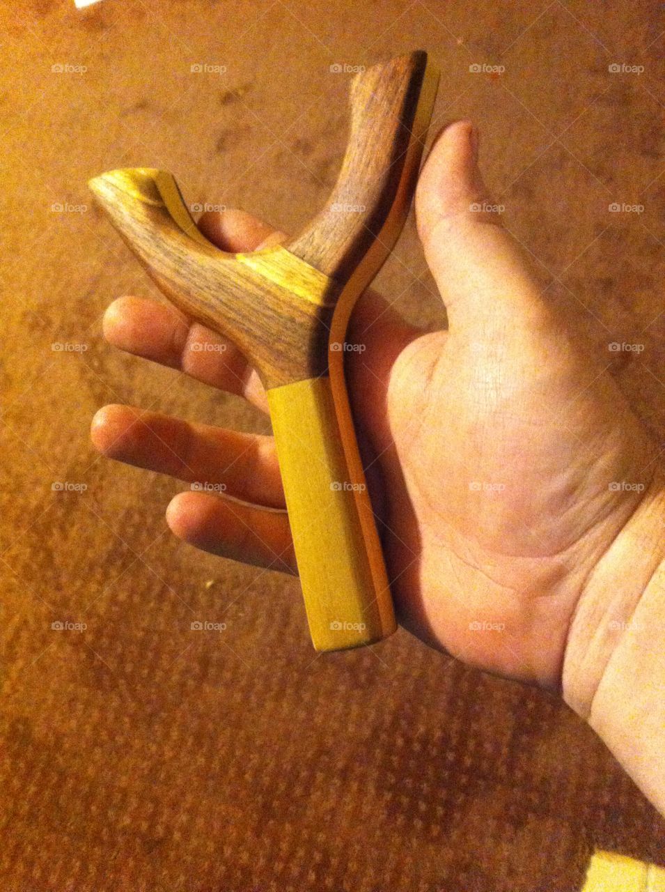 Okie Beanflips. A three wood homemade laminate hand carved sling shot I made for my son.
