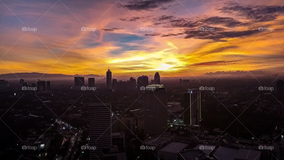 dusk at the end of Jakarta