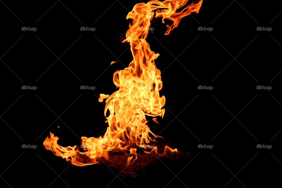 Fire against black background