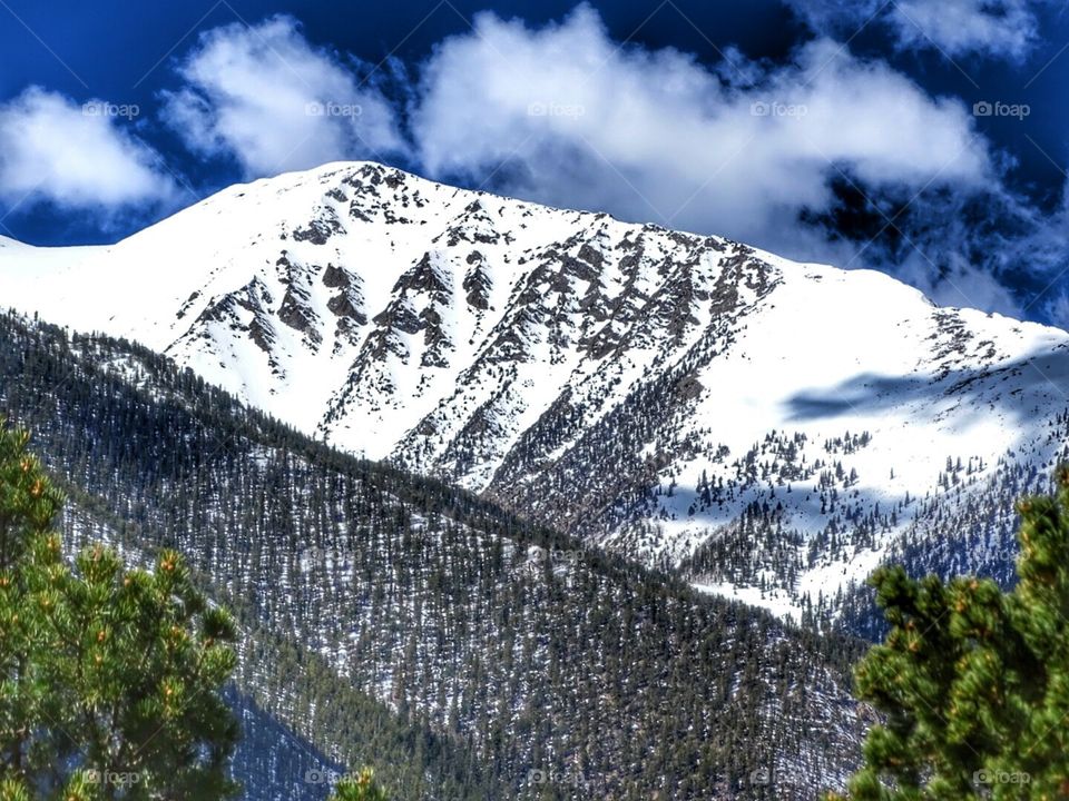 Sunny Snow Capped Mountain. beautiful day and surroundings  at Deer Valley  Ranch 