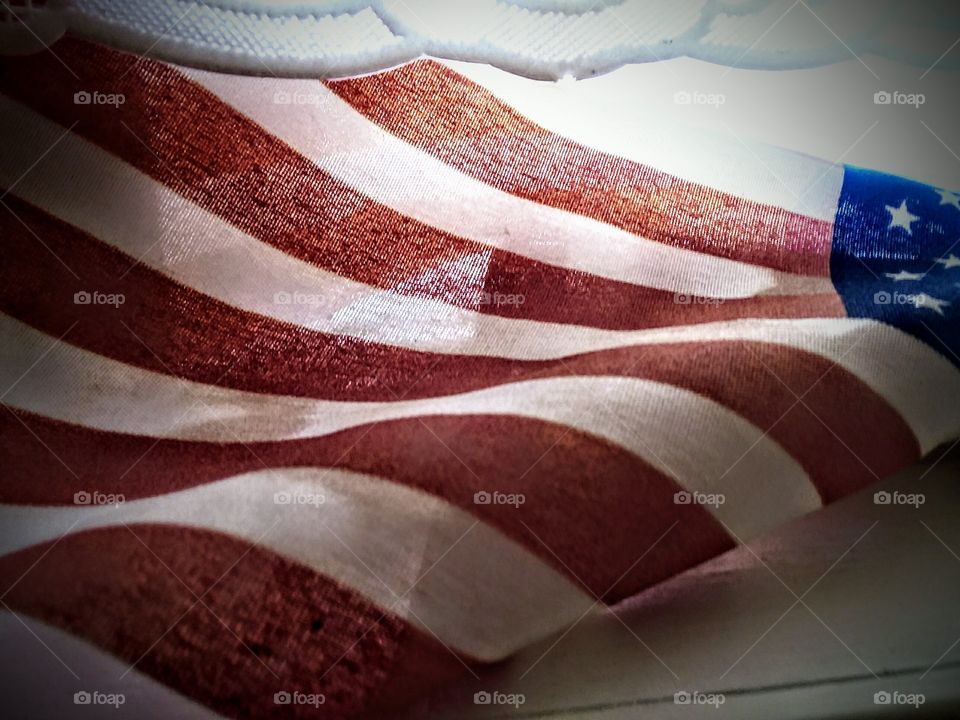 Close-up American Flag in Window