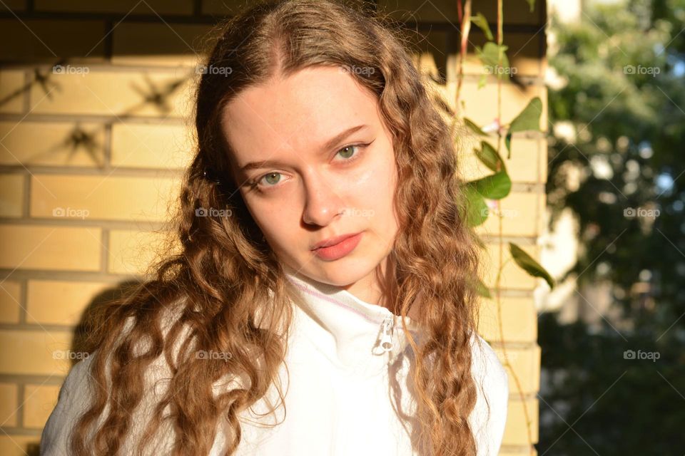 young girl beautiful portrait in sunlight