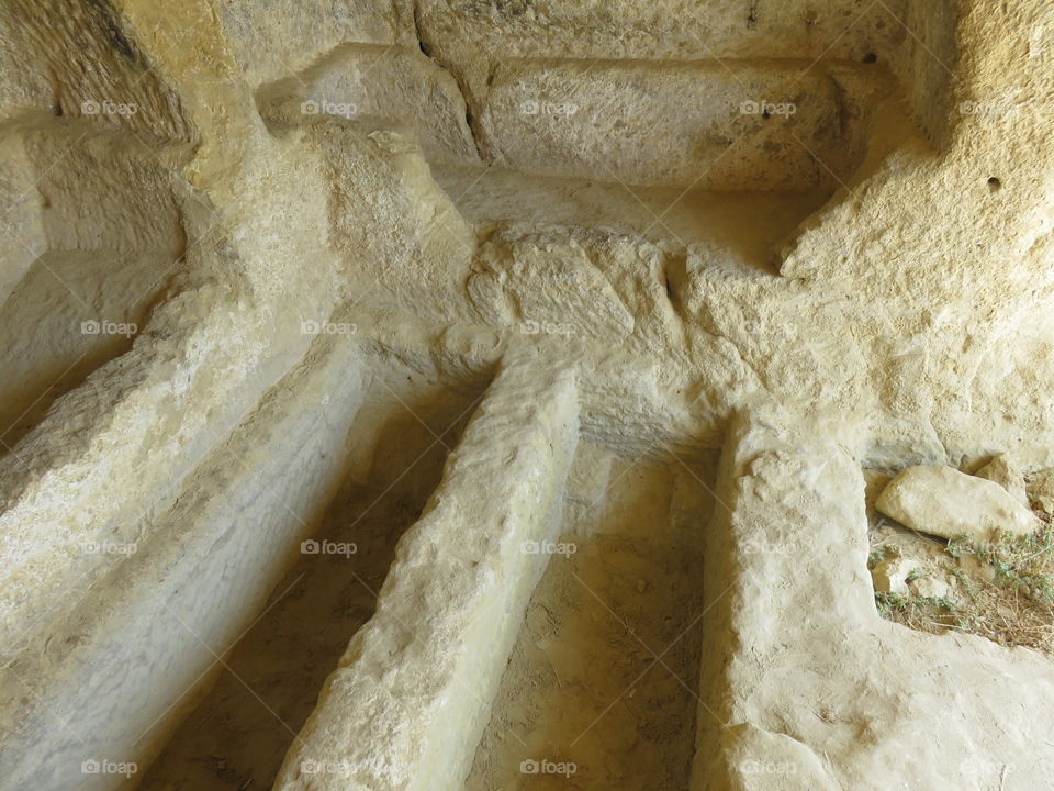 Ancient catacombs in Crete carved in limestone