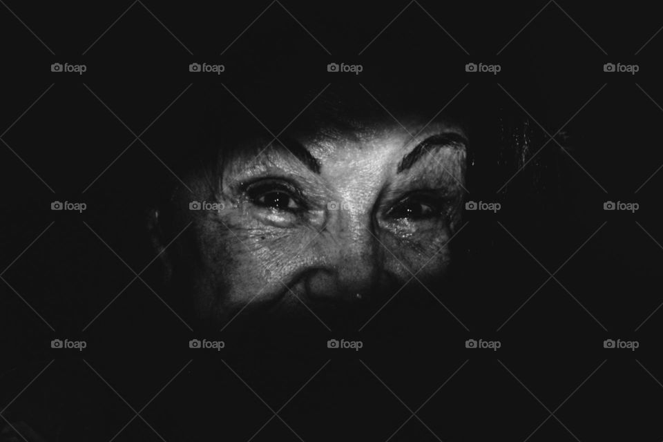 Grandma Eyes, detail fine art in black and white. Beautiful emotional minimalist photo. Old lady eyes.