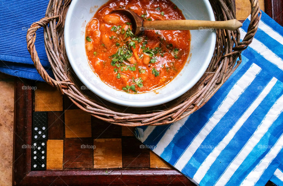 Butter beans with tomatoes in bowl