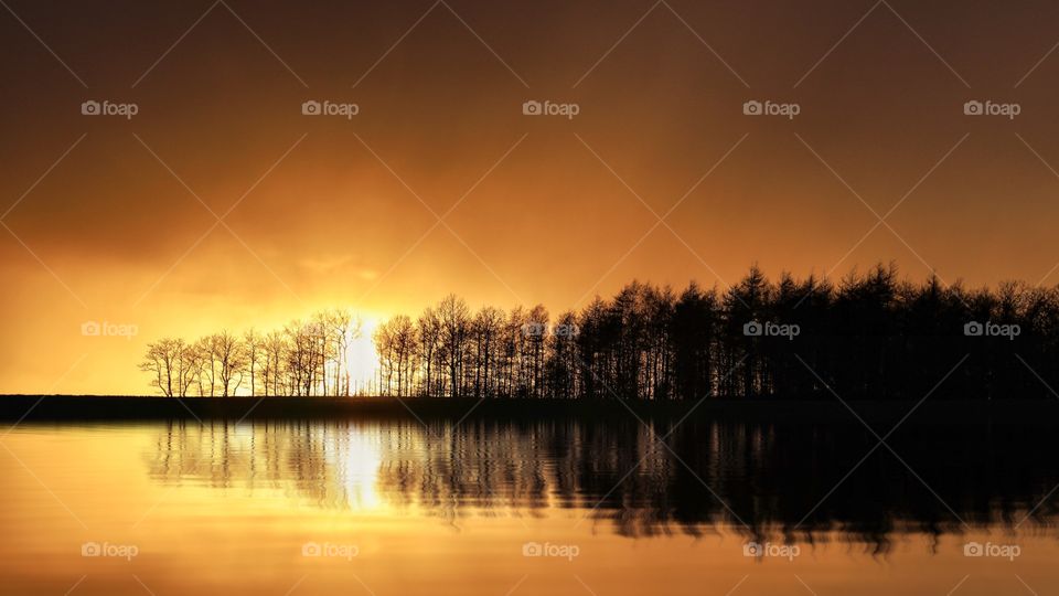 Beautiful sunset just like fire in the sky. The warm colors from the sun are so lovely