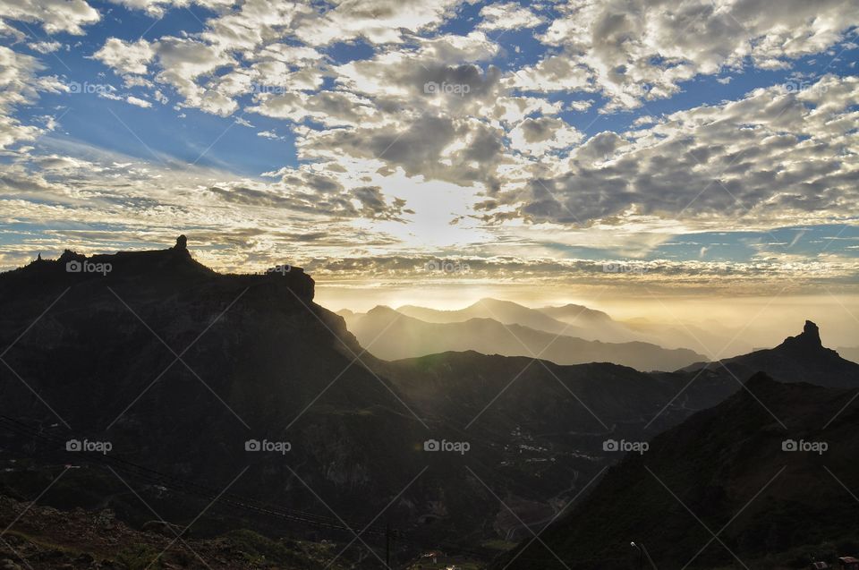 Sunlight falling on mountains