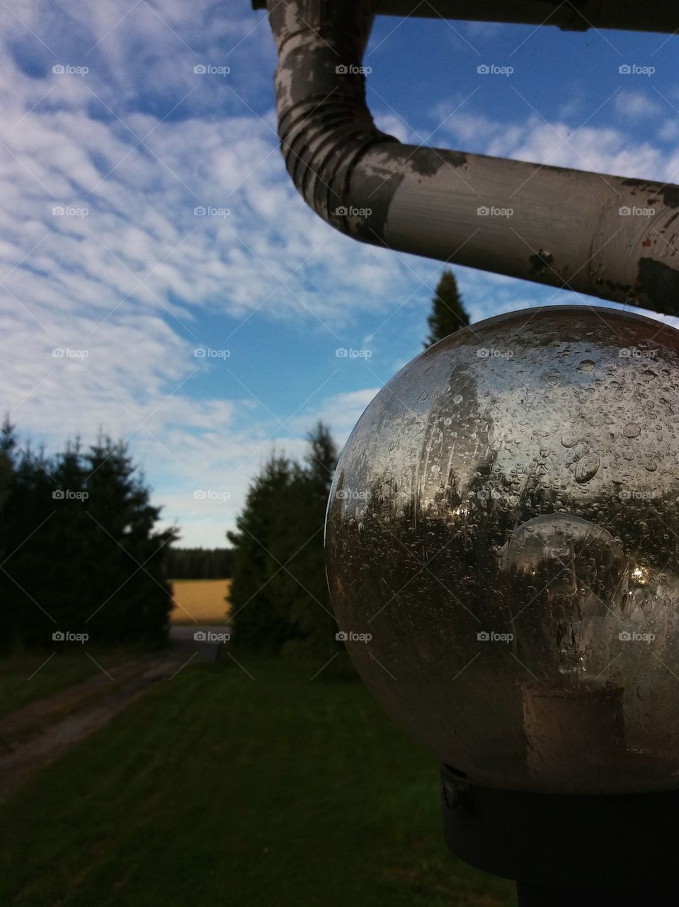 Rainwater pipe and lamp