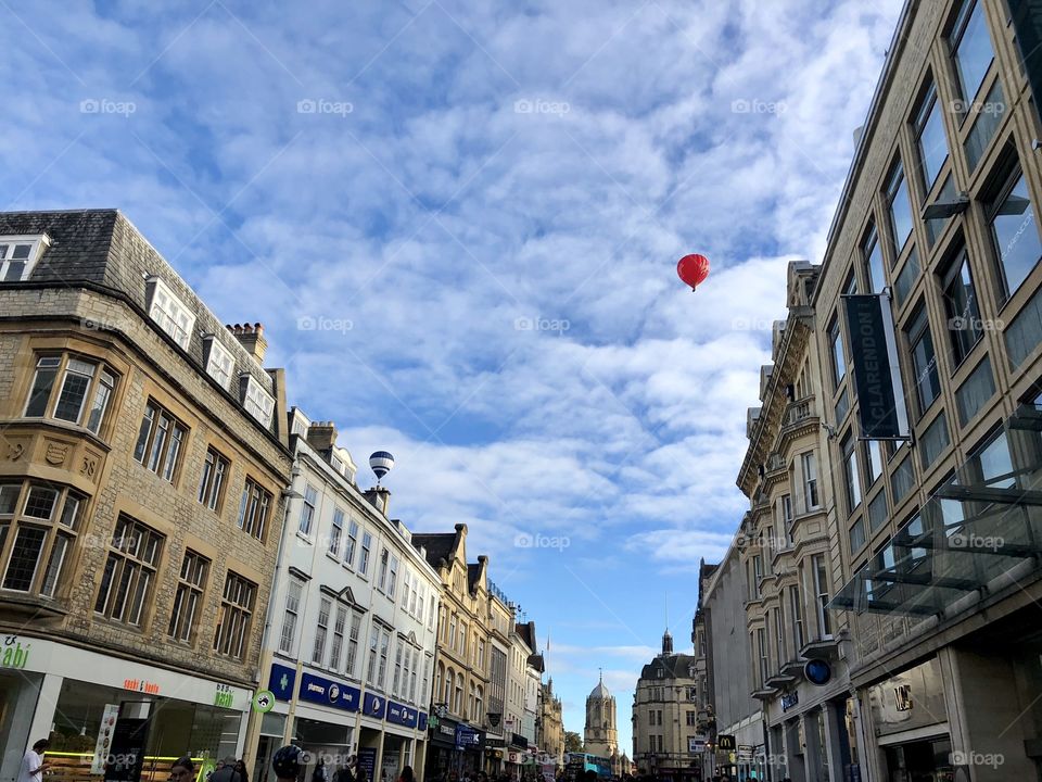 High street Blue sky clouds Air Balloon