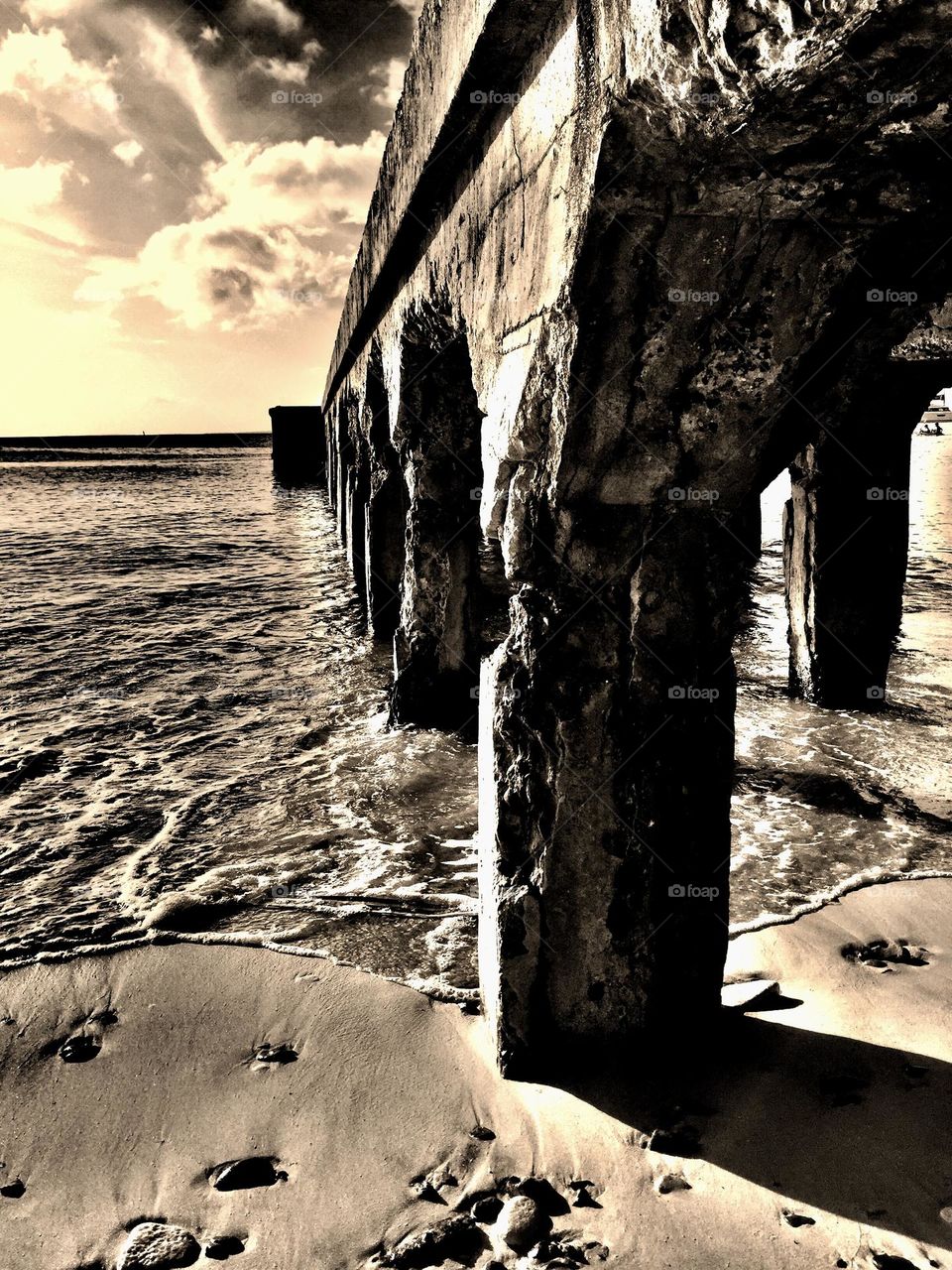 Pier on the beach, sepia image, piers of the Caribbean, different perspectives of piers 