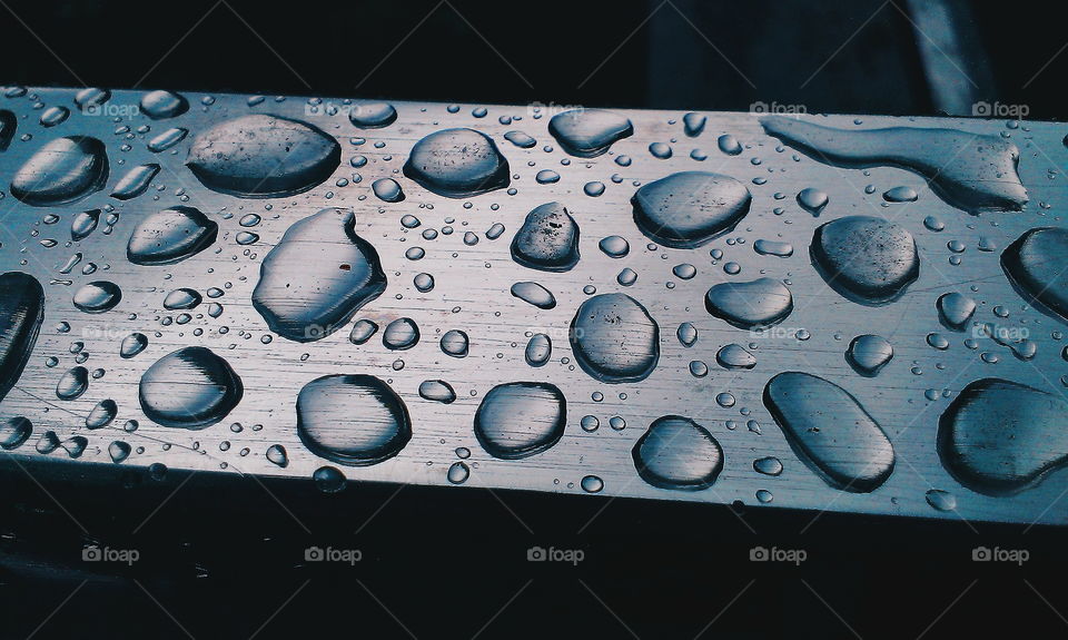 water drops on a steel handrail