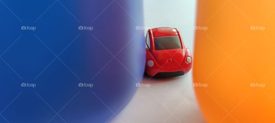 Red Beetle crossing Blue and Orange