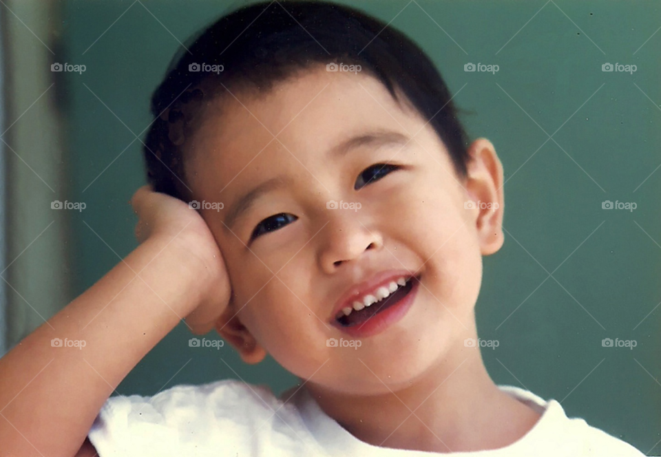 happy smile boy asian by supong