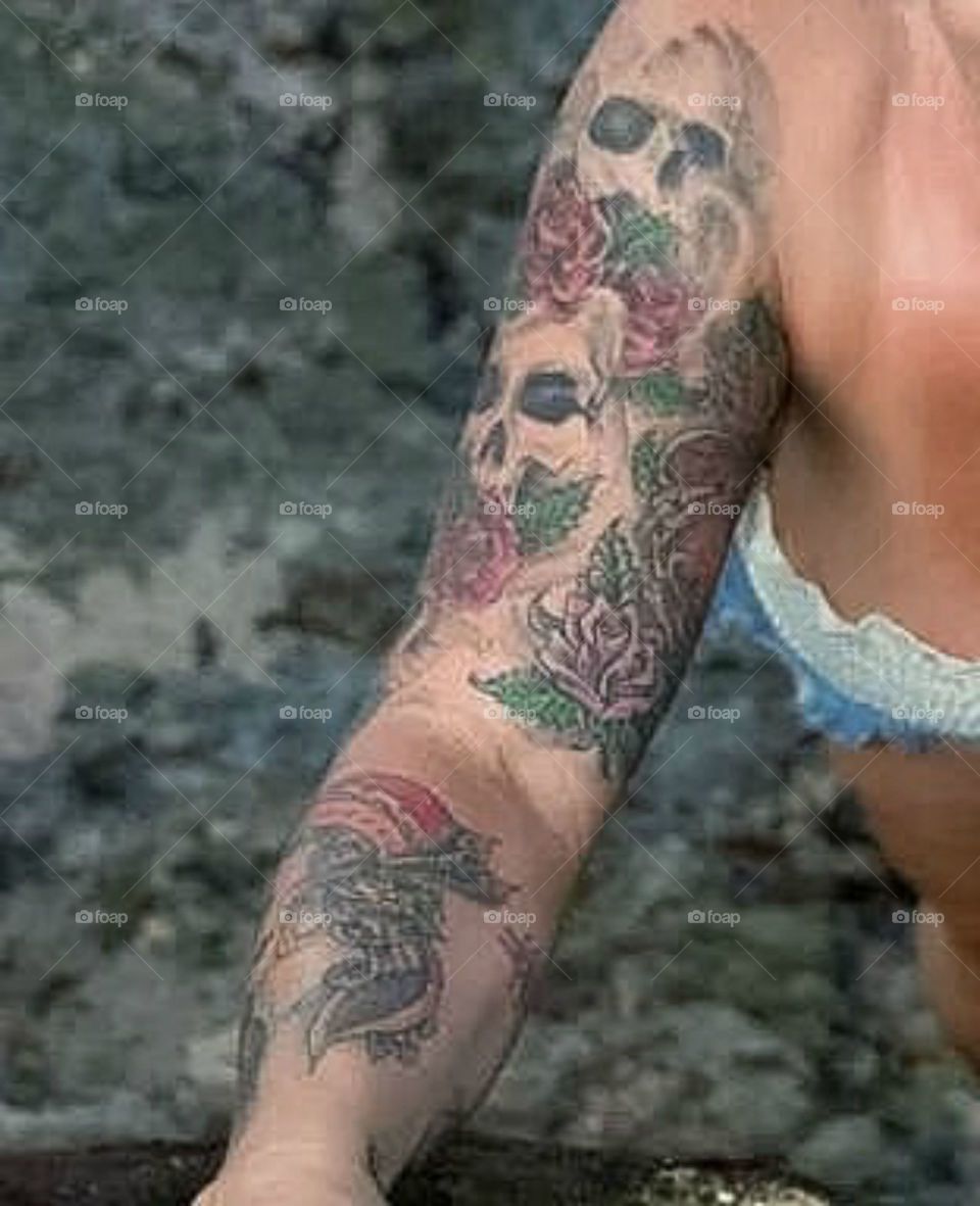 Floral tattooed arm

