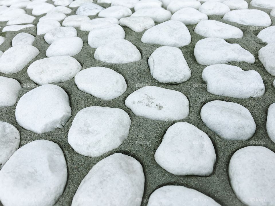 Full frame of a white pebble stone