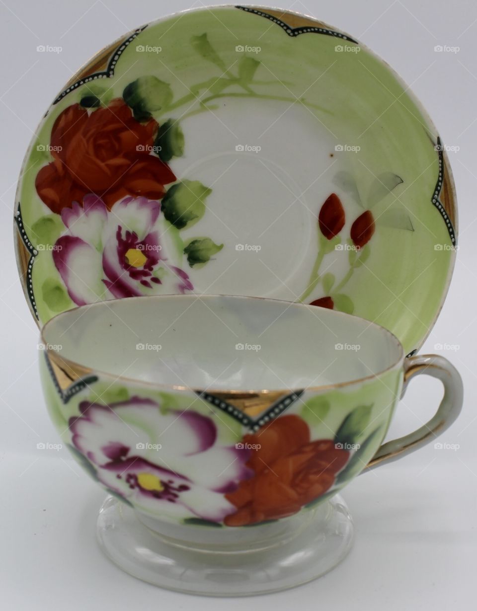 Green teacup and saucer set