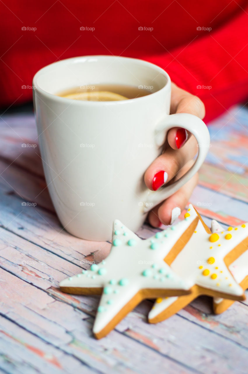 woman hand with cup of tea