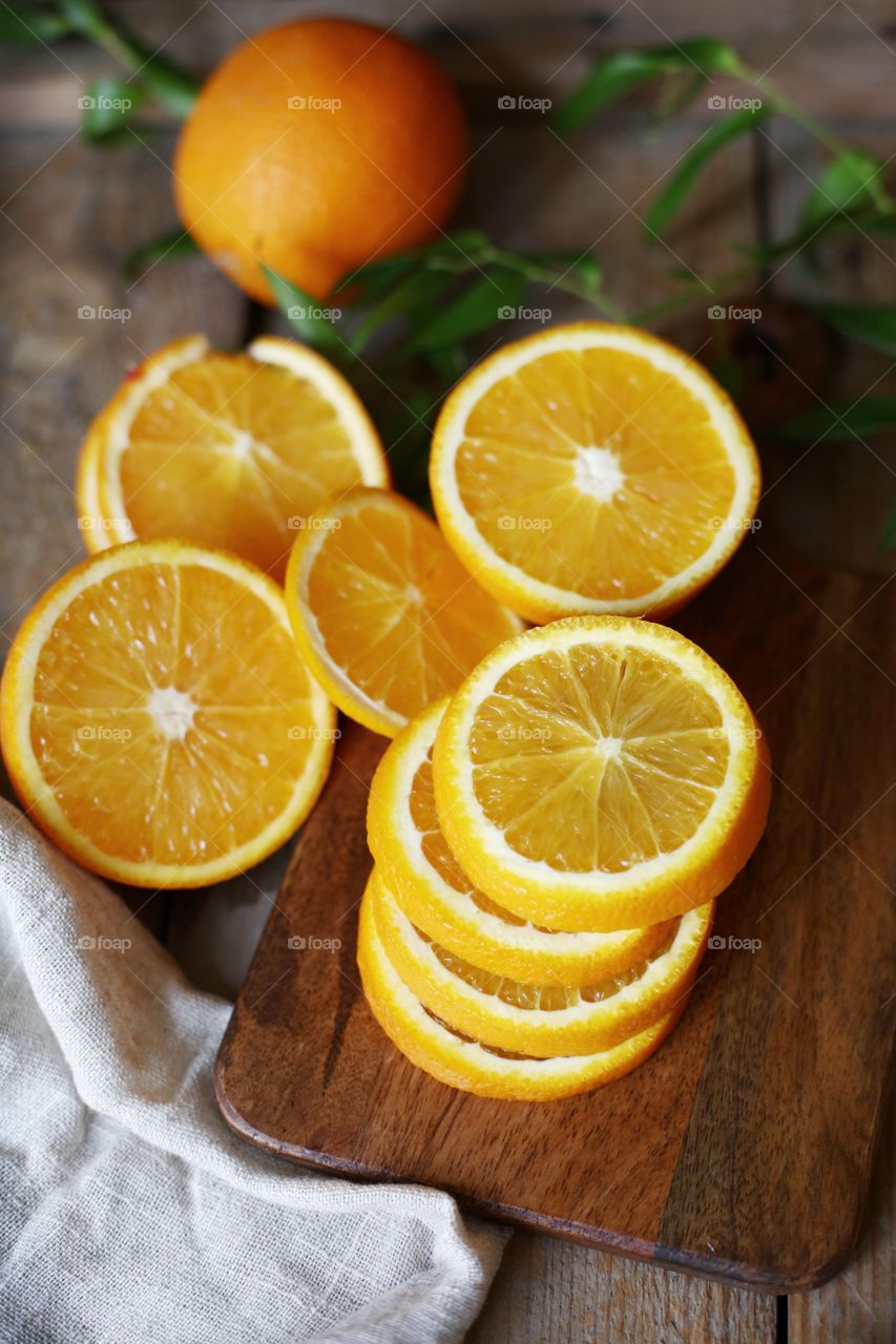 orange slices on the cutlery board
