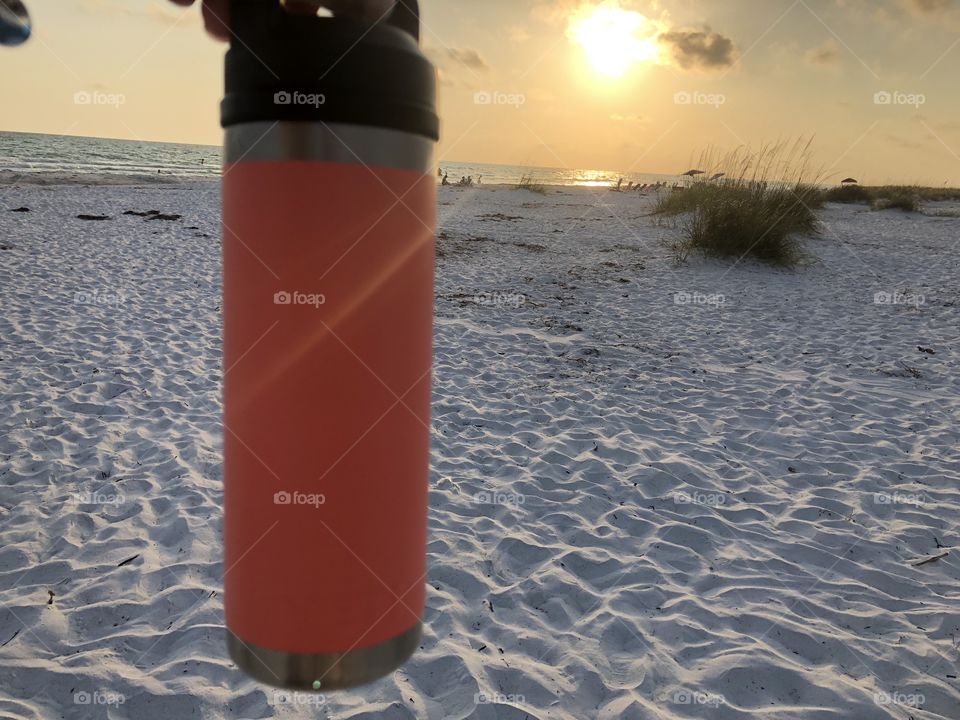 Enjoying a drinking in my limited edition Yetti Rambler at Bean Point on Anna Maria Island at sunset. 