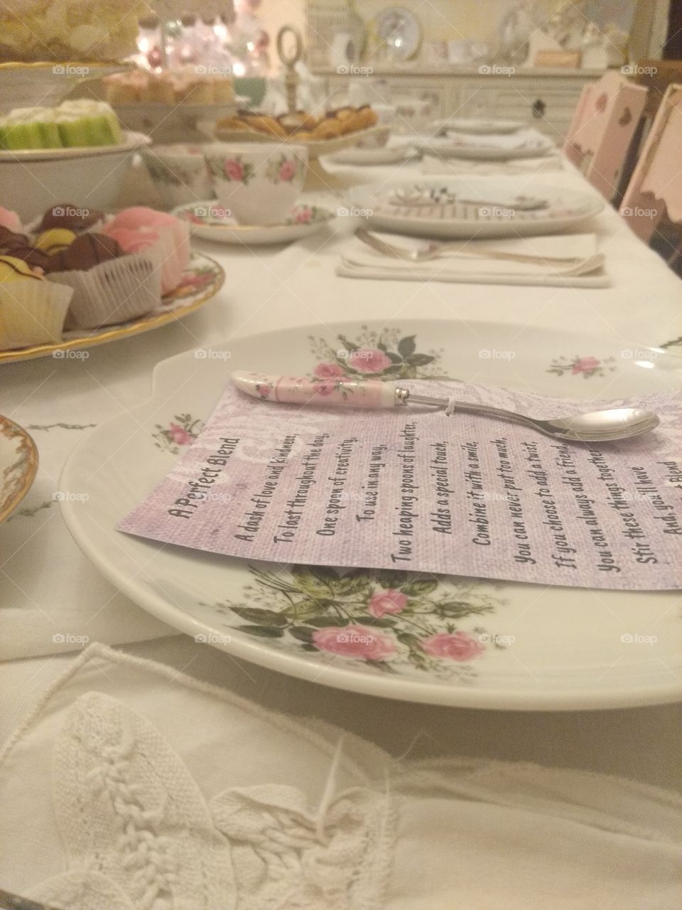 Low view of plate setting and desserts