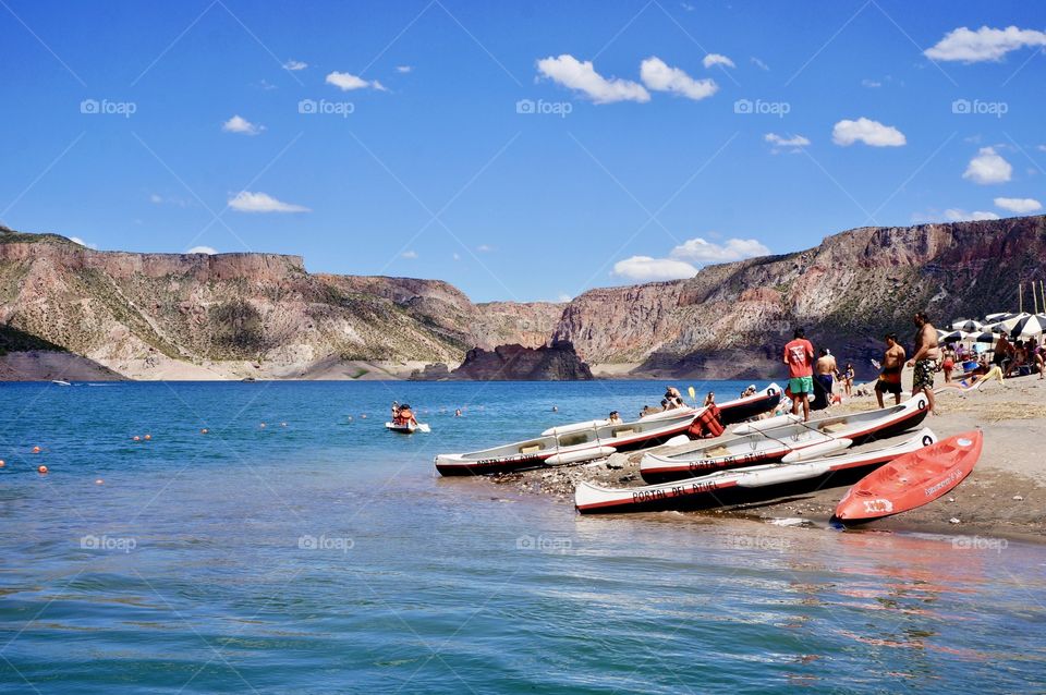 Canoeing on a beautiful lake with gorgeous mountain views 