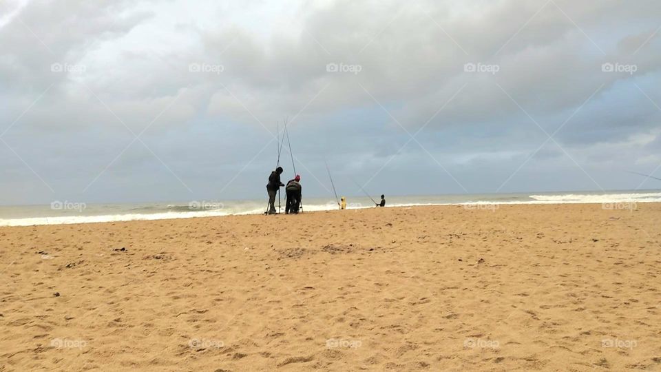 Fisherman on the bech