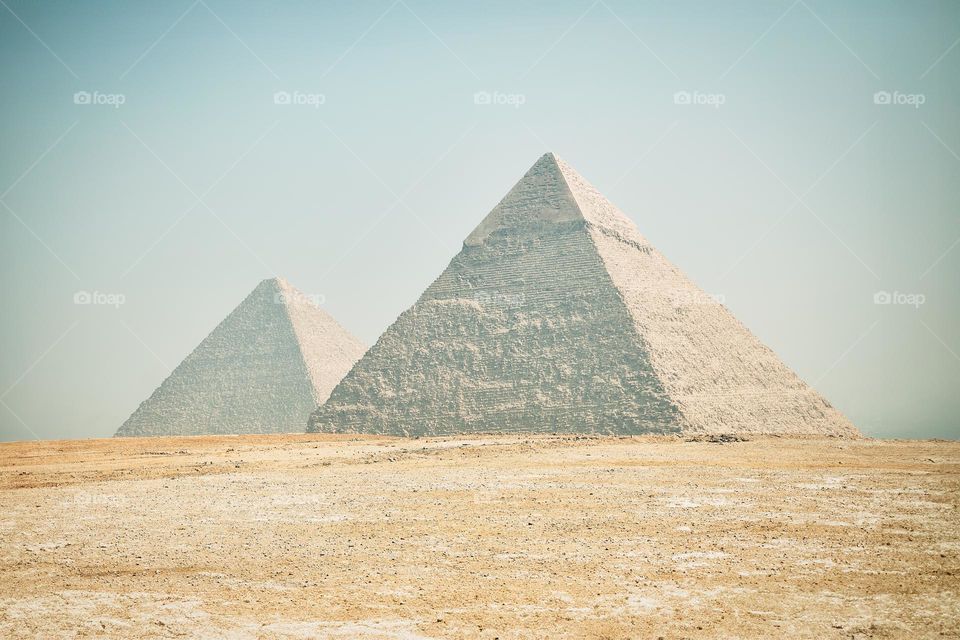 Pyramids of Giza. Most visited Egyptian landmark. Ancient Egypt. Giza Necropolis. Most recognizable among the Seven Wonders of the World. Vacation destination. Historic site. Tours and sightseeing